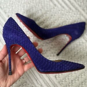 Louboutins crocodile print Pumps